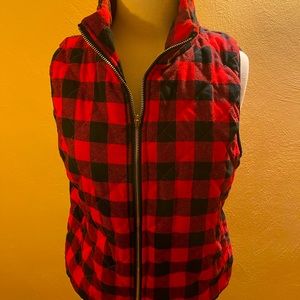 A cute, Buffalo check, quilted vest.